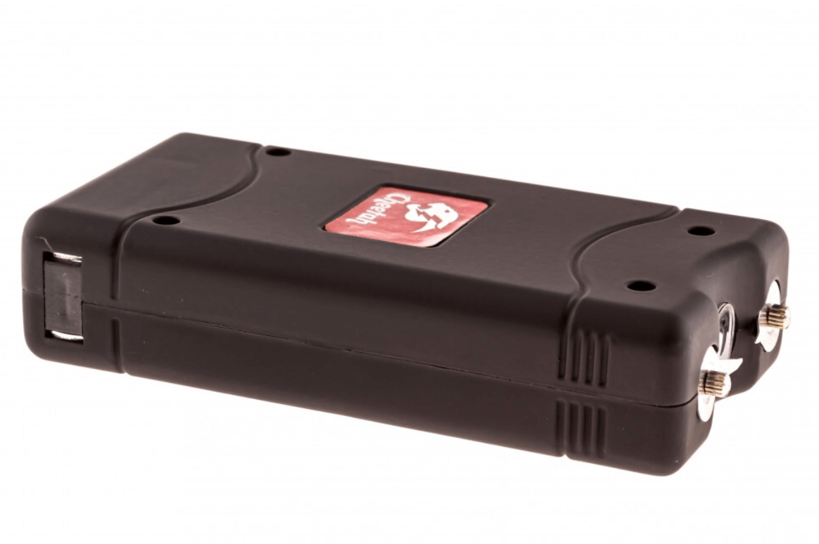 Compact black pocket stun gun with contact probes at one end and a built-in LED flashlight, sized to fit in a pocket or purse
